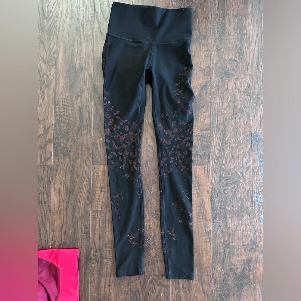 Lululemon black with leopard print legging. Size 2.